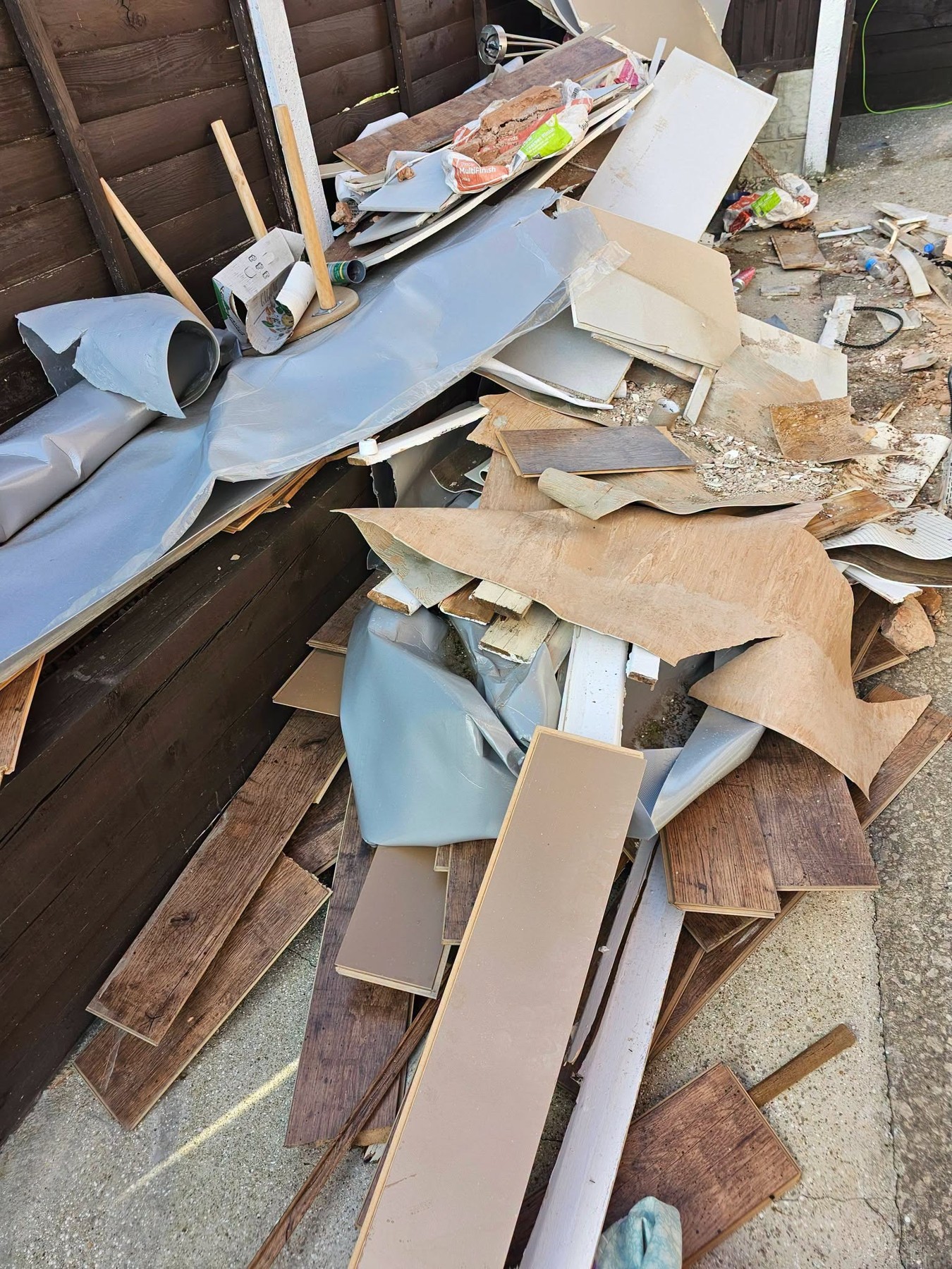 Before clearance: waste in walkway